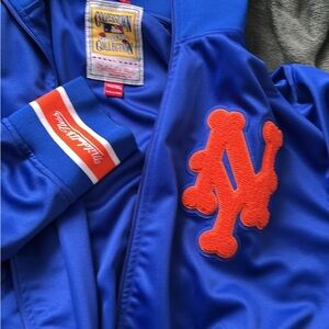 Mitchell & Ness Blue Bomber Jacket with Vibrant Mets Logo